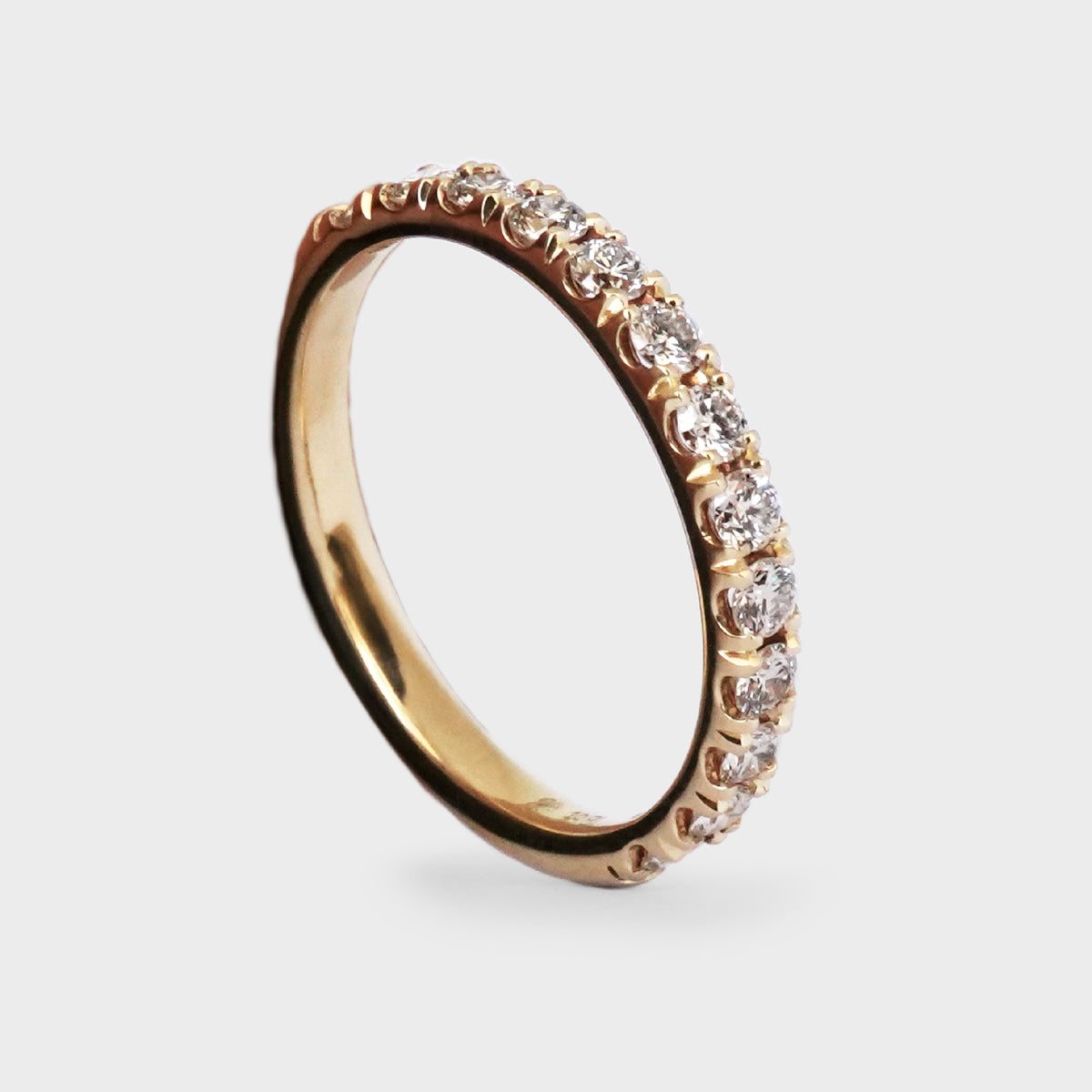 Medio cintillo grifas 13 diamantes 0.52ct