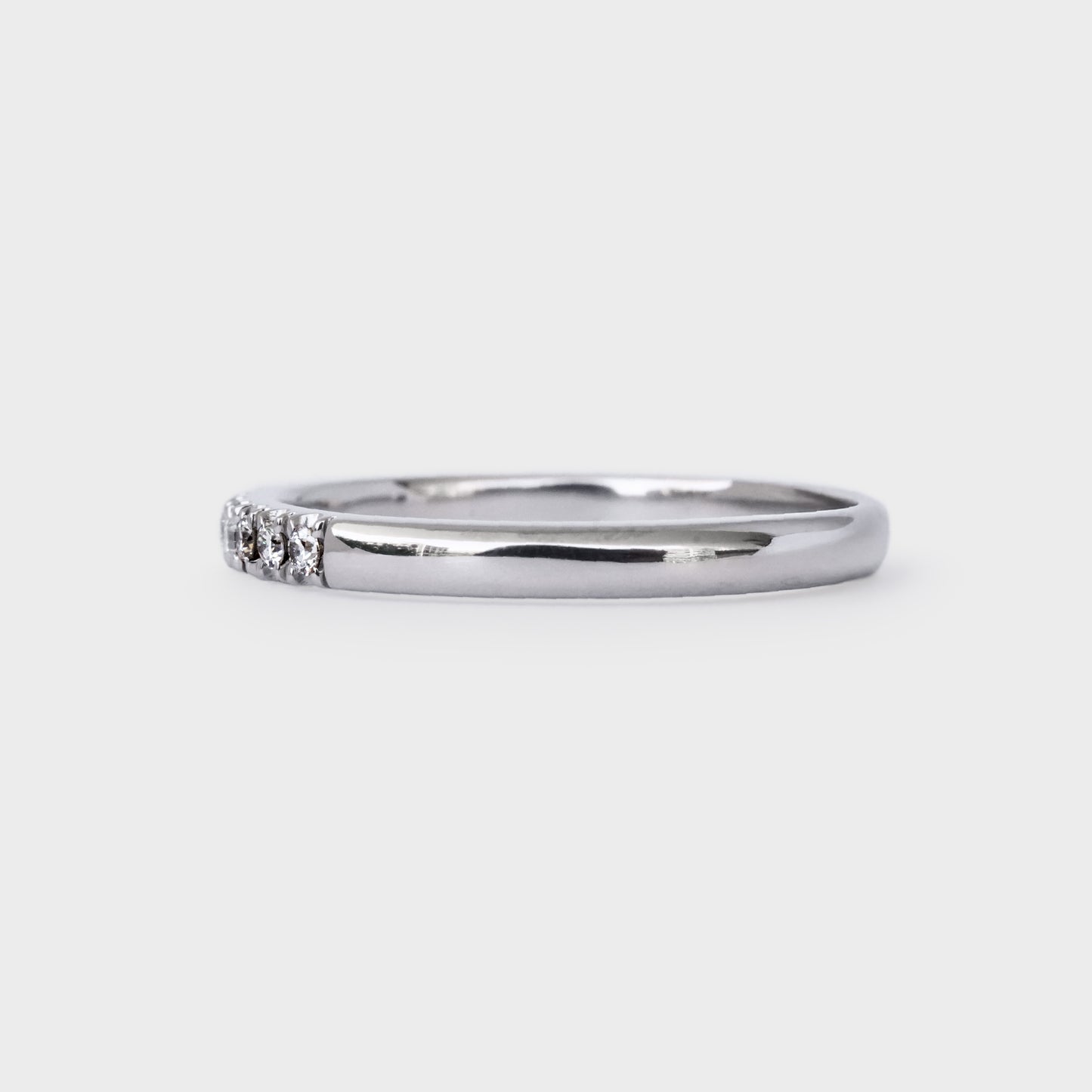 Medio cintillo oro blanco con 9 diamantes 0.18ct
