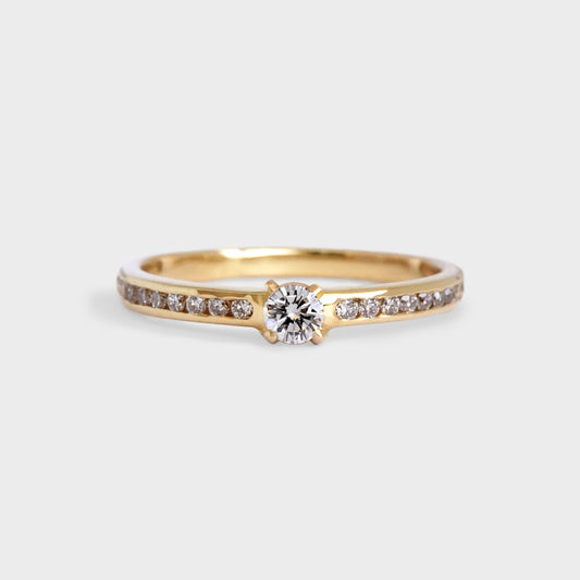 Solitario brillante 0.13ct acompañado