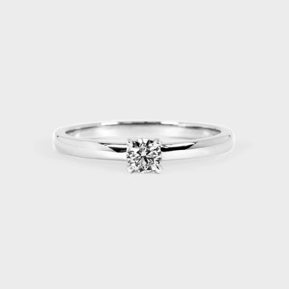 Anillo solitario 0.16ct 4 grifas