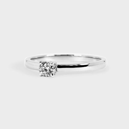 Anillo solitario 0.16ct 4 grifas