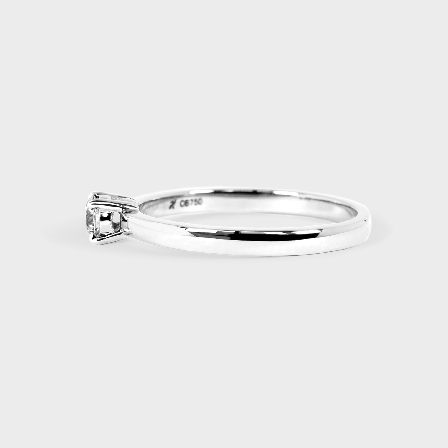 Anillo solitario 0.16ct 4 grifas