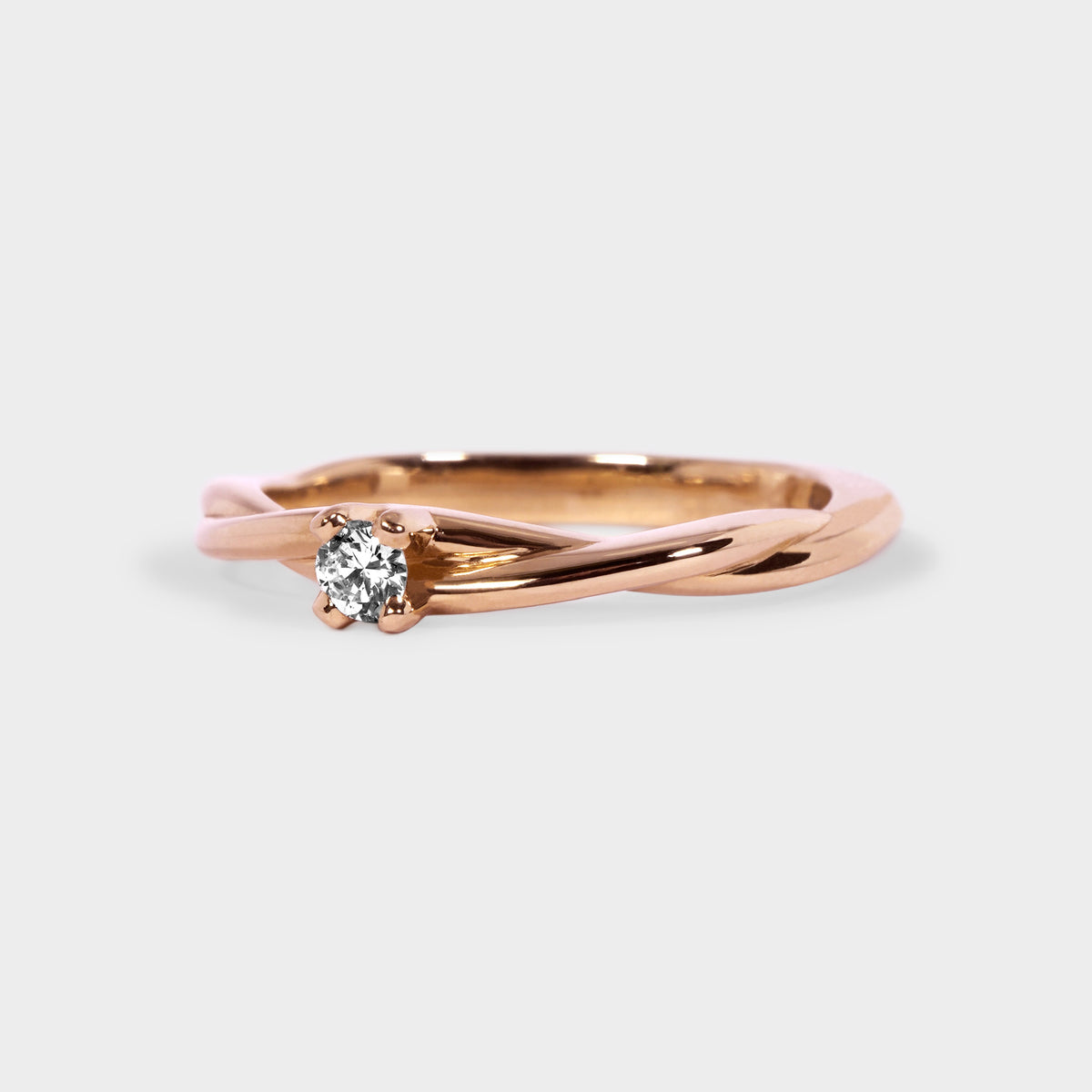 Anillo trenza solitario oro rosado