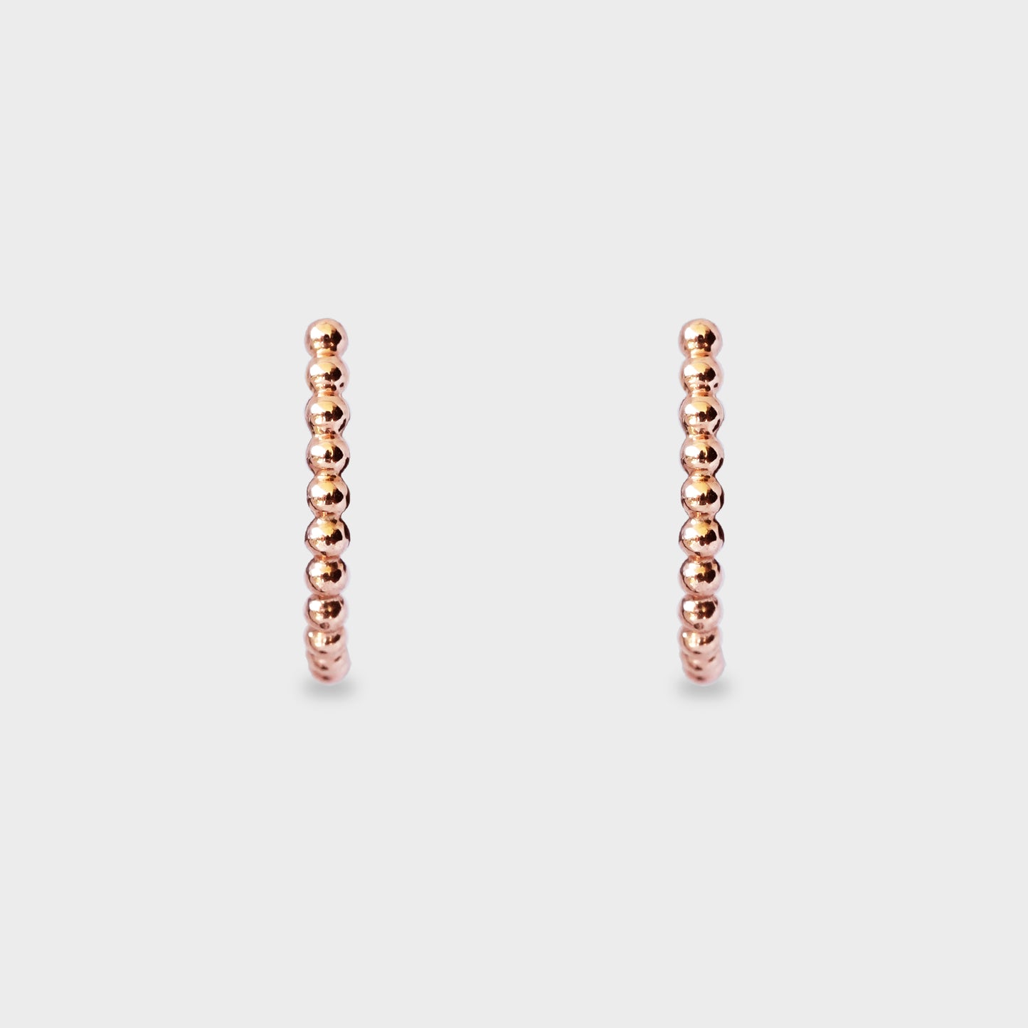 Aros arcos de esferas oro rosado