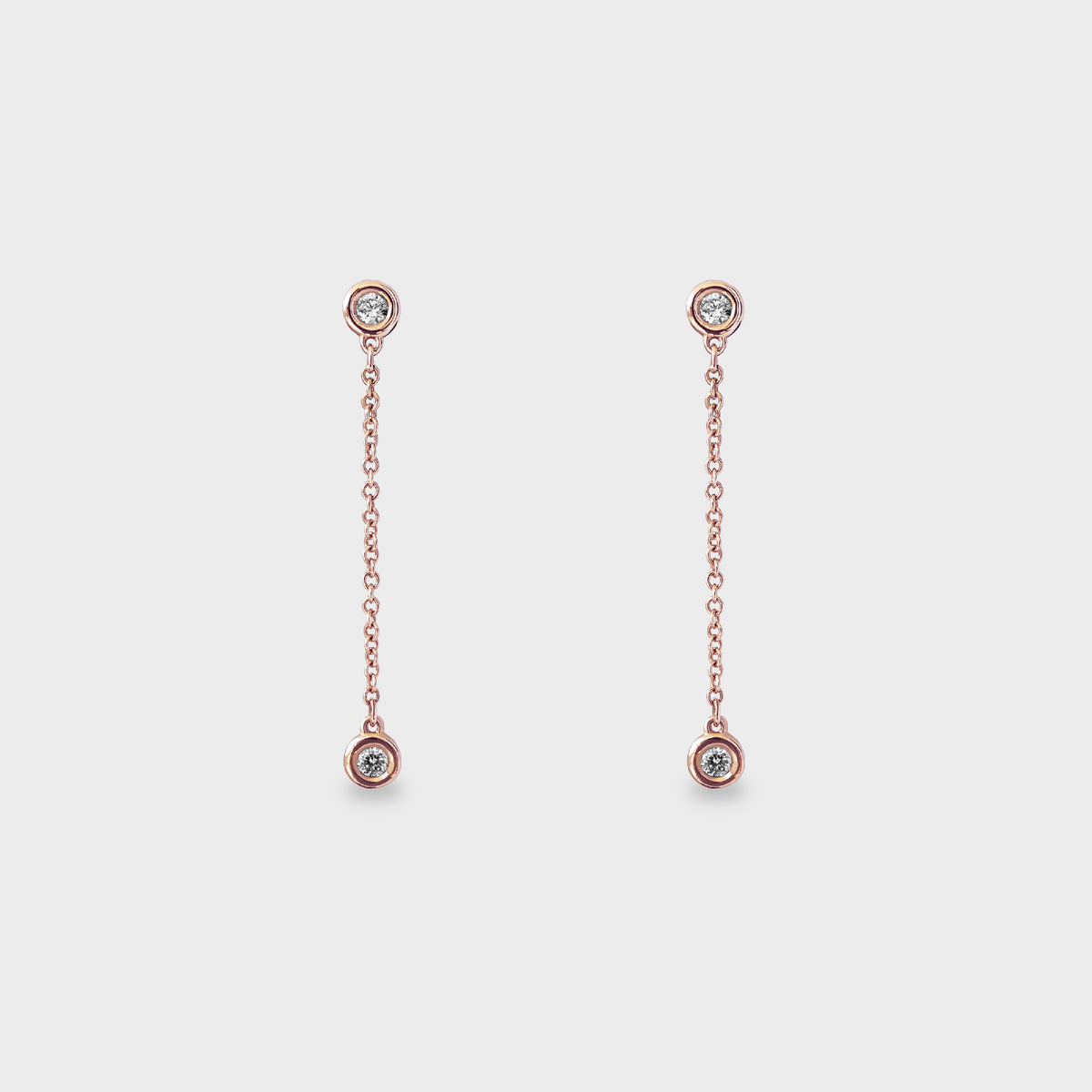 Aros colgantes de engaste botón oro rosado