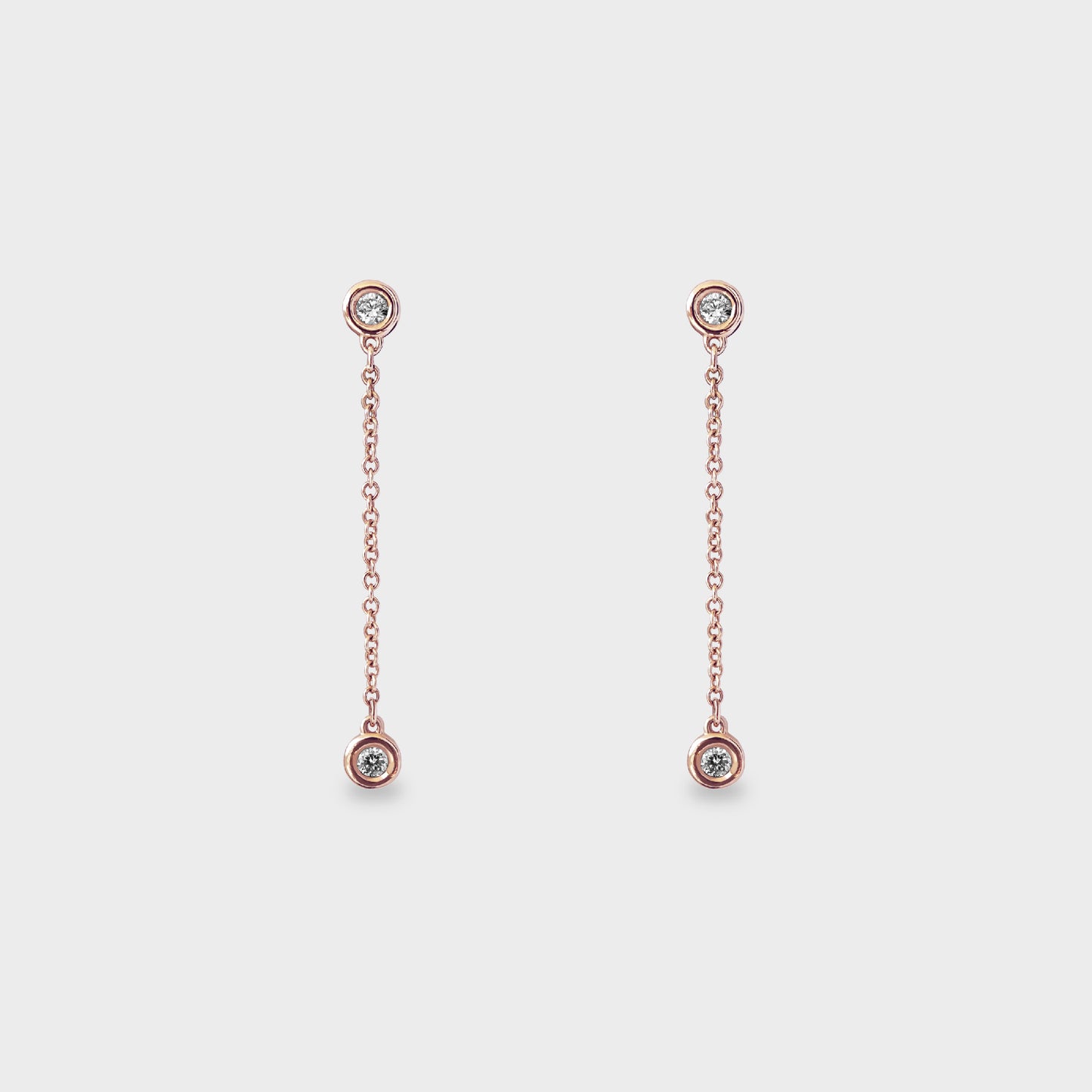 Aros colgantes de engaste botón oro rosado