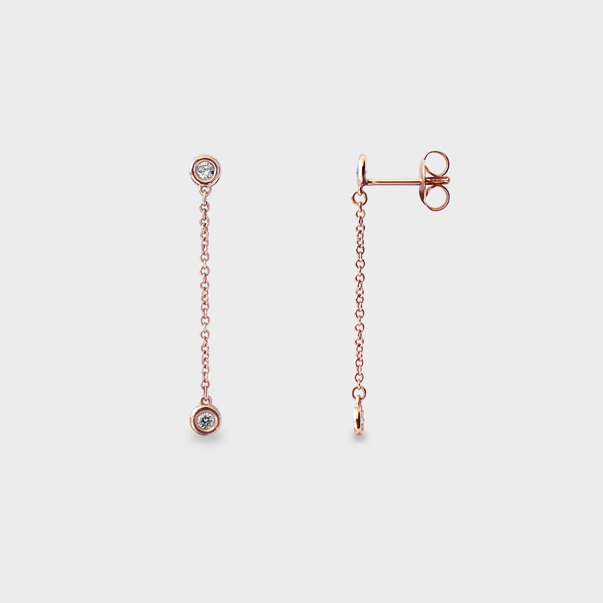 Aros colgantes de engaste botón oro rosado