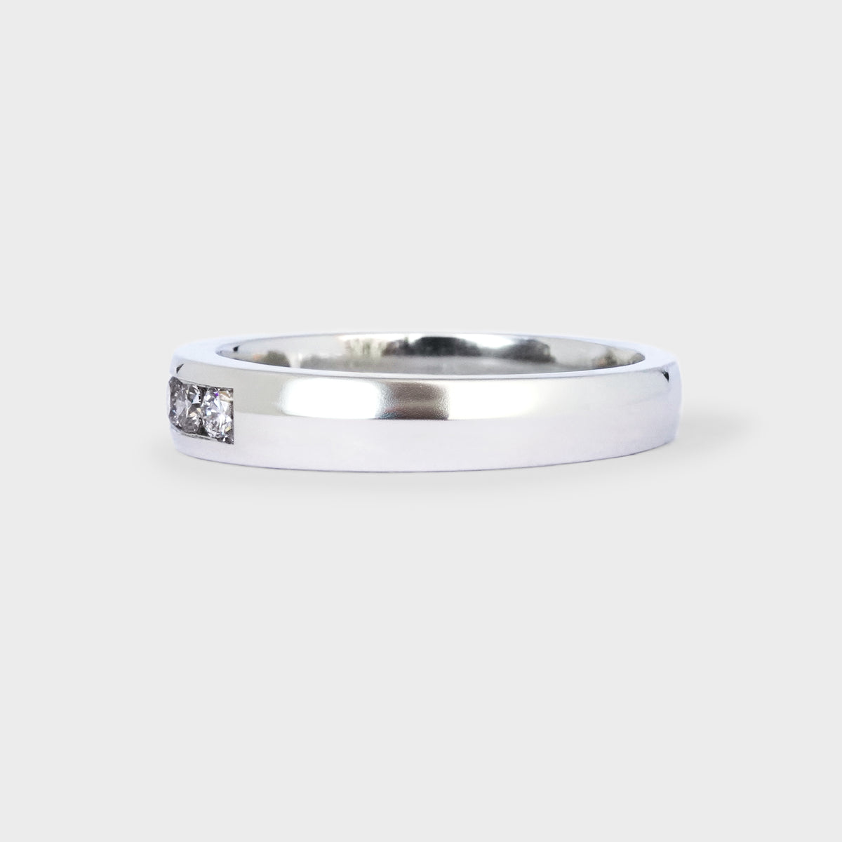Medio cintillo riel 5 diamantes 0.3ct