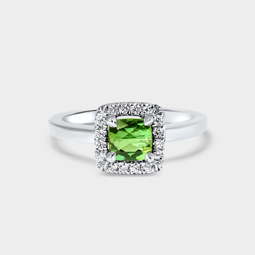 Anillo platino turmalina verde halo