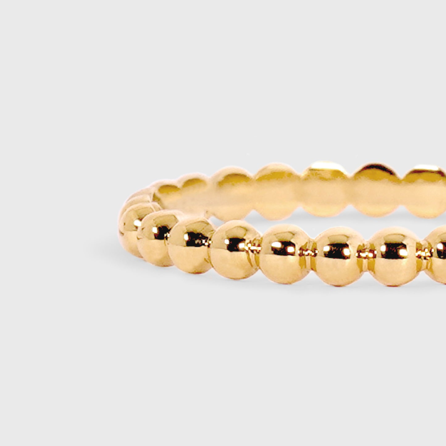 Anillo esferas 360° oro amarillo